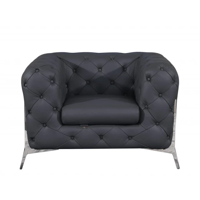 alt=Glam gray chrome tufted leather armchair with comfortable rectangular design