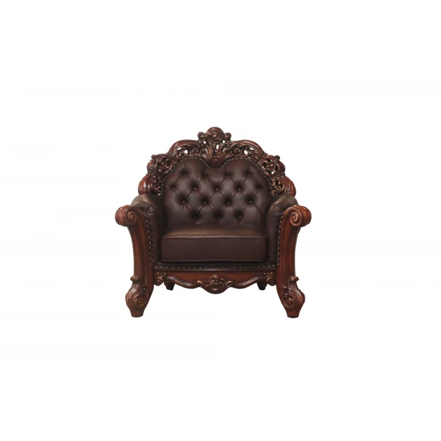 Brown faux leather tufted club chair with metal accents and pattern details