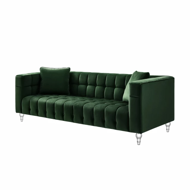 Green velvet sofa with clear toss pillows and comfortable rectangle studio couch design