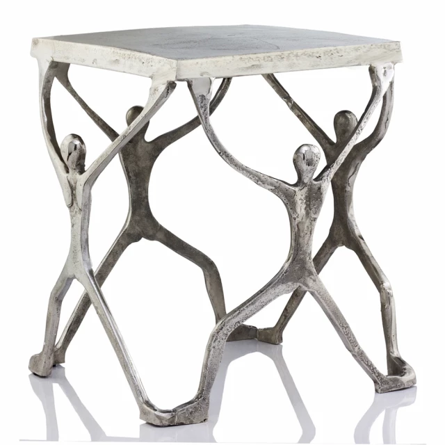 Silver antiqued white aluminum end table with twig design in a natural setting