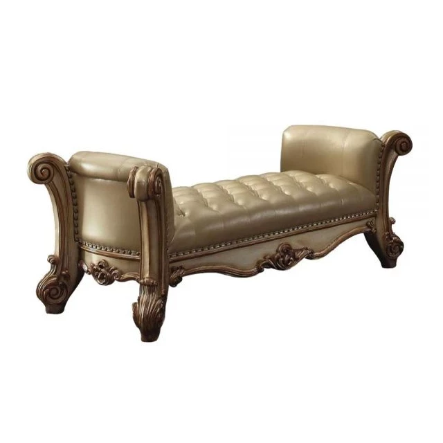Beige gold upholstered faux leather bench with armrests for comfortable seating in a modern home or office