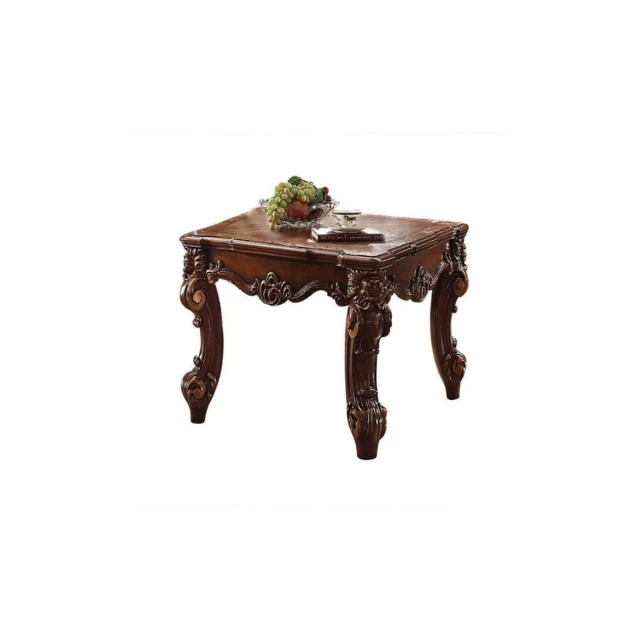 Cherry manufactured wood square end table in a setting with chairs and outdoor furniture elements