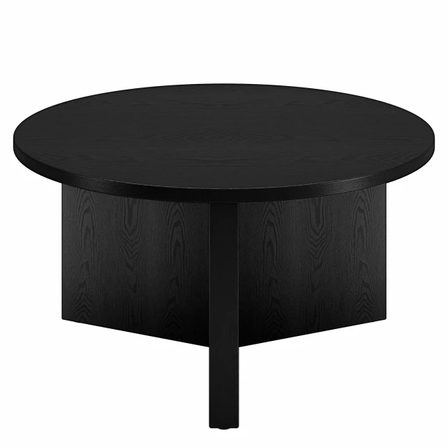 Black round coffee table with composite material in furniture setting