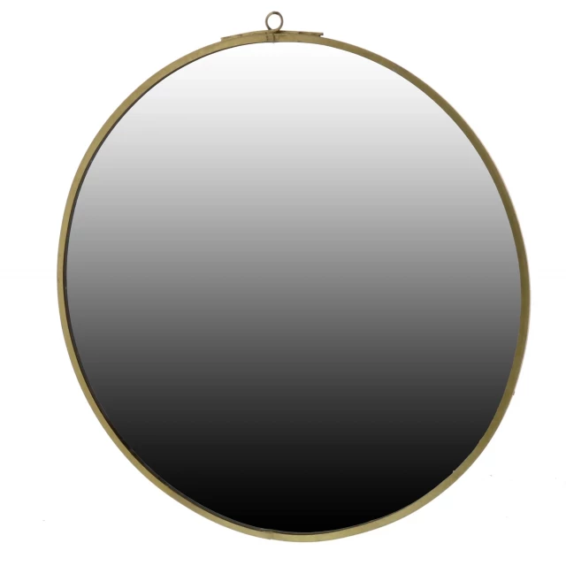 Gold round wall mirror displaying symmetry and pattern with a metallic finish for home decor