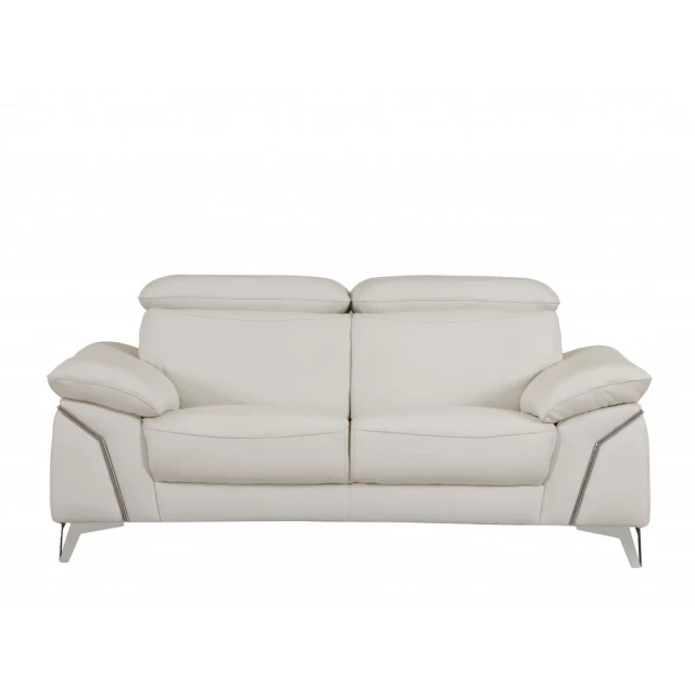 White silver Italian leather sofa with comfortable cushioning and sleek design