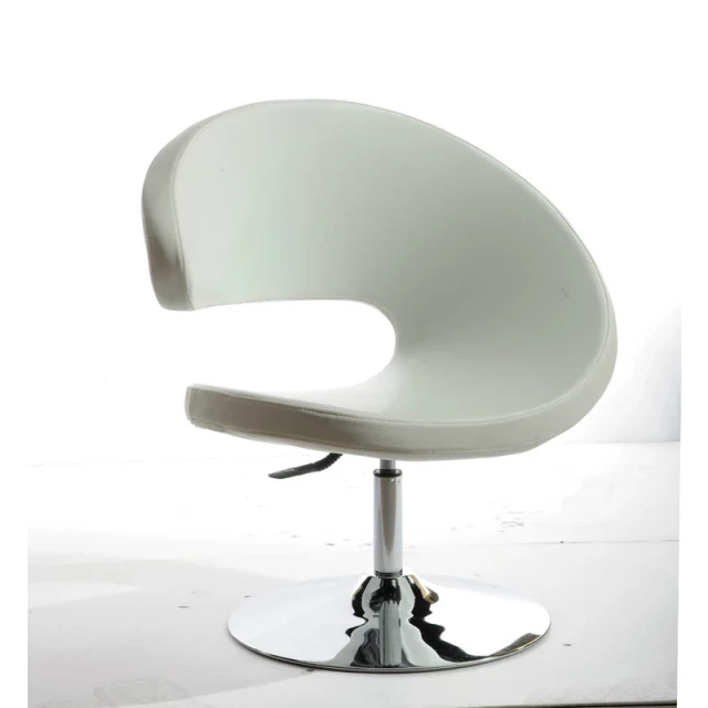 White leatherette lounge chair with table lamp and modern room decor