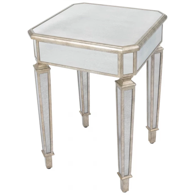 Silver glass square end table with wood stain and hardwood finish in an outdoor setting