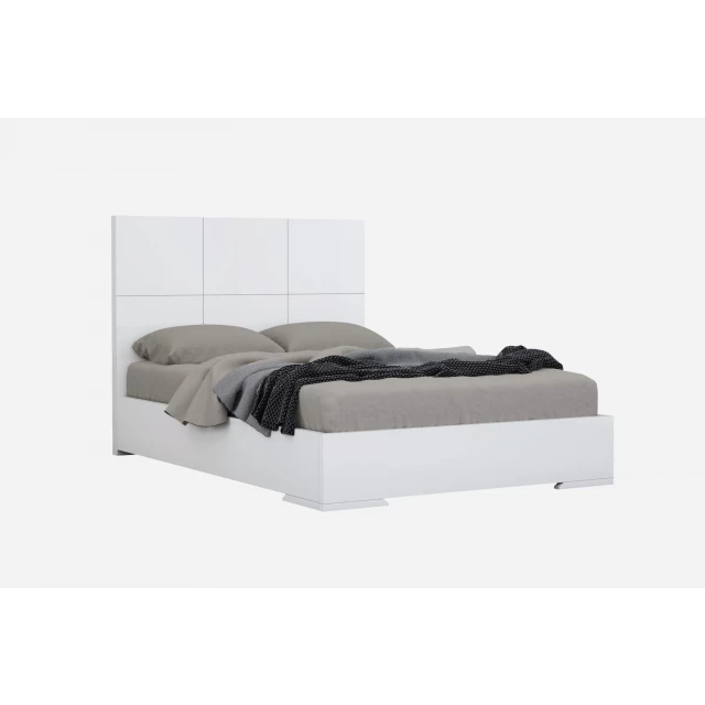 King white bed in a modern bedroom setting