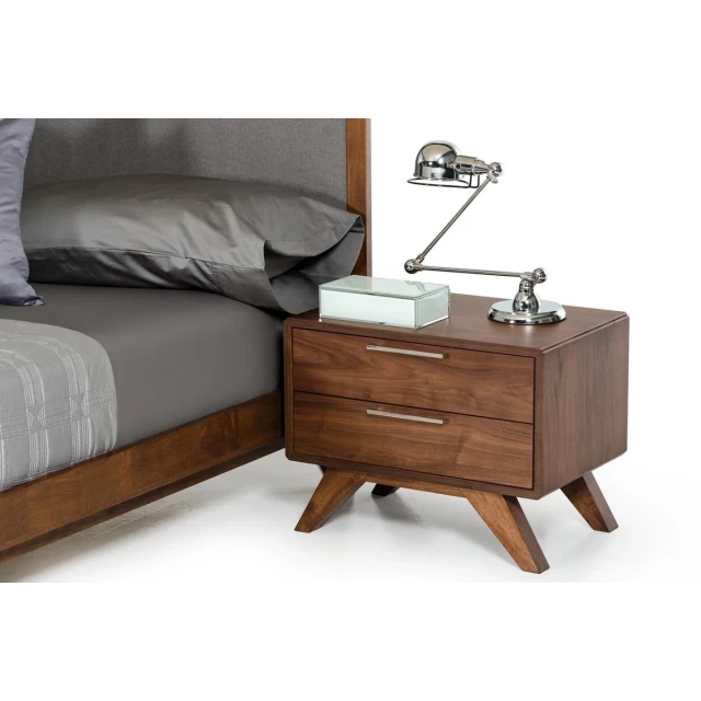 Modern walnut brown nightstand with drawers and sleek wood design for bedroom interior