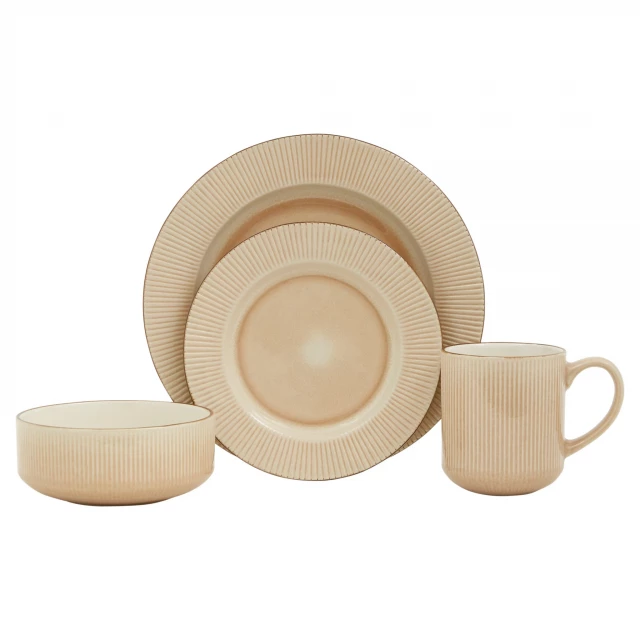 Round striped ceramic dinnerware set including tableware dishware drinkware and cup on wood background