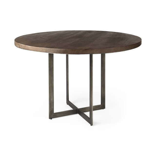 Brown round wood metal dining table with pedestal and wood stain finish