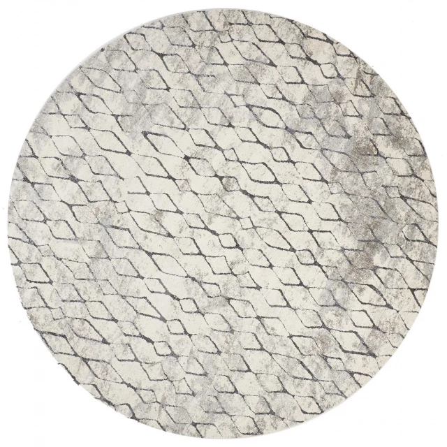 round abstract stain resistant area rug with circular and oval patterns