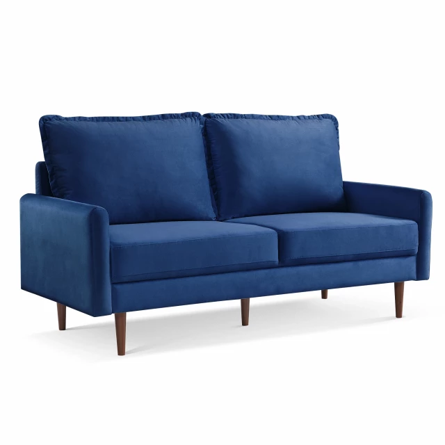Blue velvet dark brown sofa with comfortable pillows in a studio couch setup