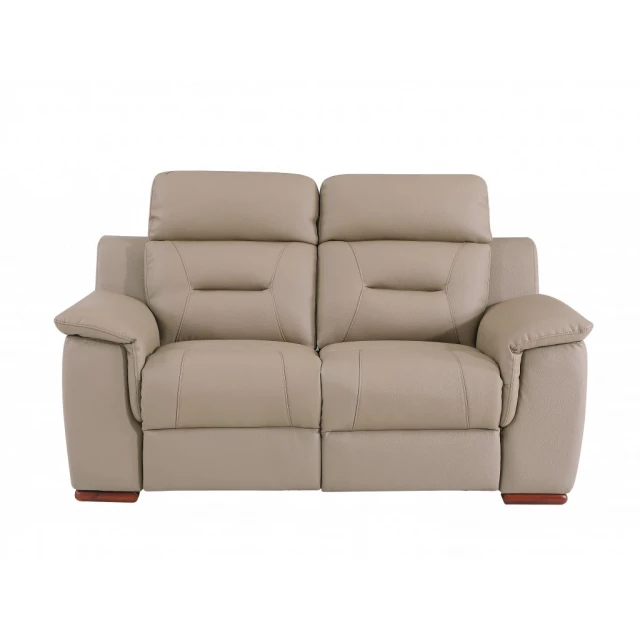 Faux leather manual reclining love seat with comfortable armrests and wooden accents