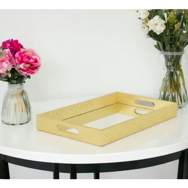 gold rectangular wood handmade tray with handles on table with flowers and vase