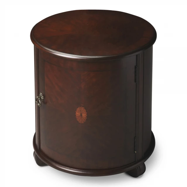 Cherry manufactured wood round end table with metal accents and leather details
