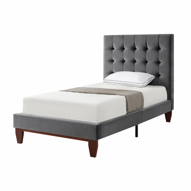 Wood twin-size tufted upholstered velvet bed in elegant bedroom setting