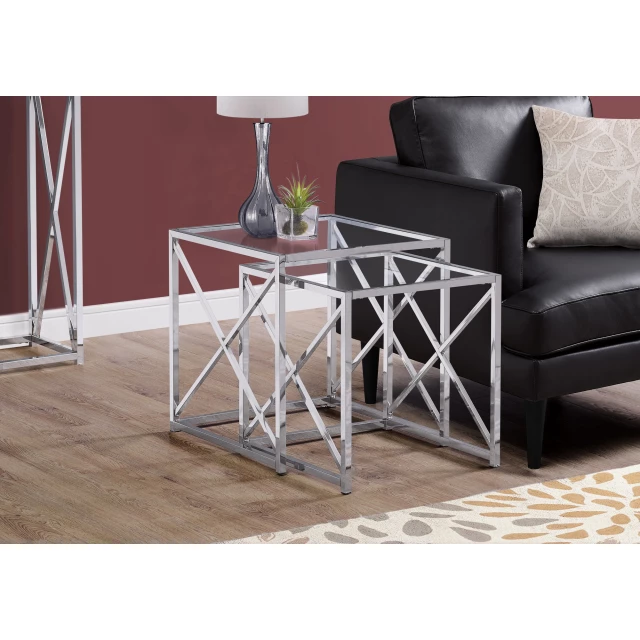 Metal tempered glass nesting tables in modern interior design with wood flooring