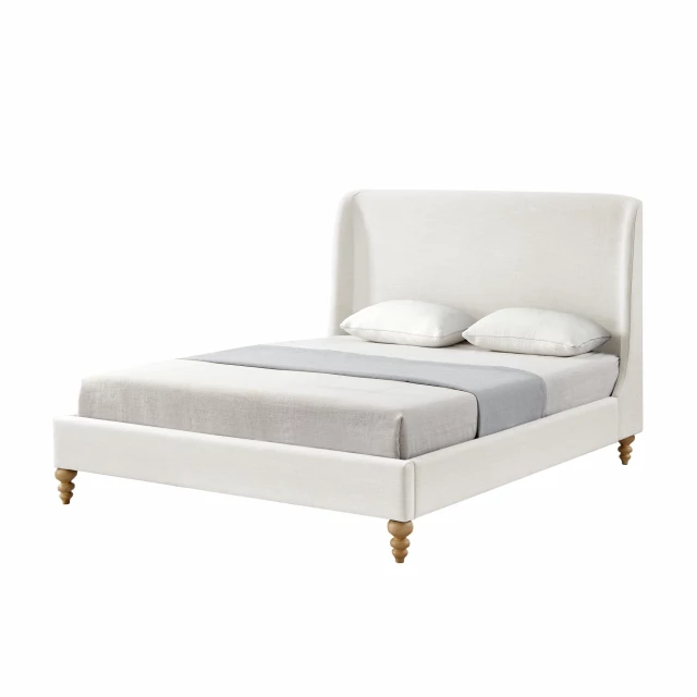 Solid wood queen upholstered linen bed in a bedroom setting