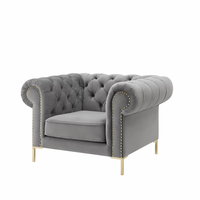 Gray gold velvet tufted chesterfield chair with armrests for comfortable seating