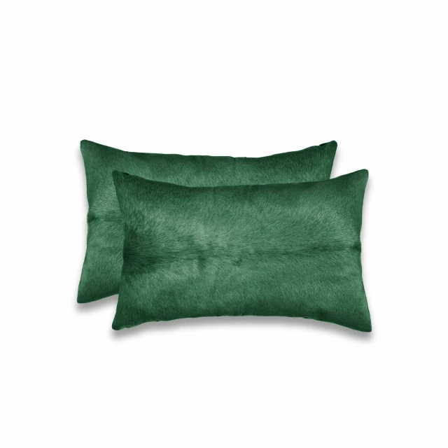 Green cowhide throw pillow with patterned design and home accessory fashion elements