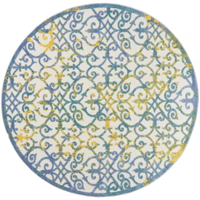 non skid indoor outdoor area rug with circular pattern and blue symmetrical design