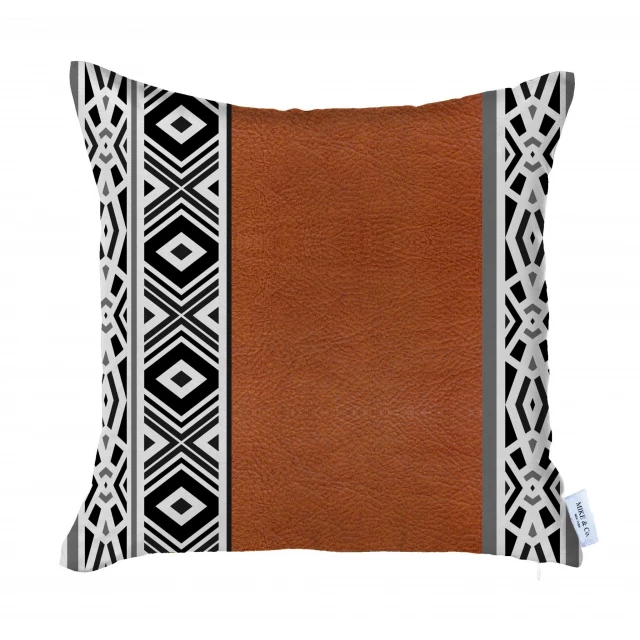 Brown faux leather geometric throw pillow on couch with wood accents