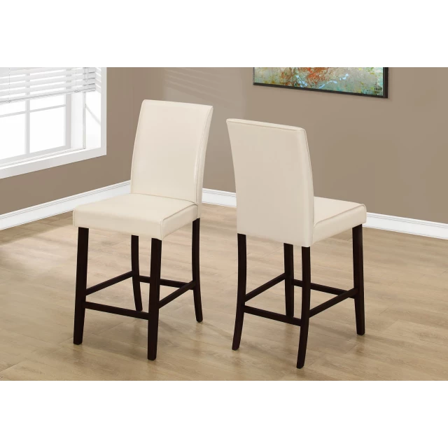 Solid wood counter height bar chair with armrests on wooden floor