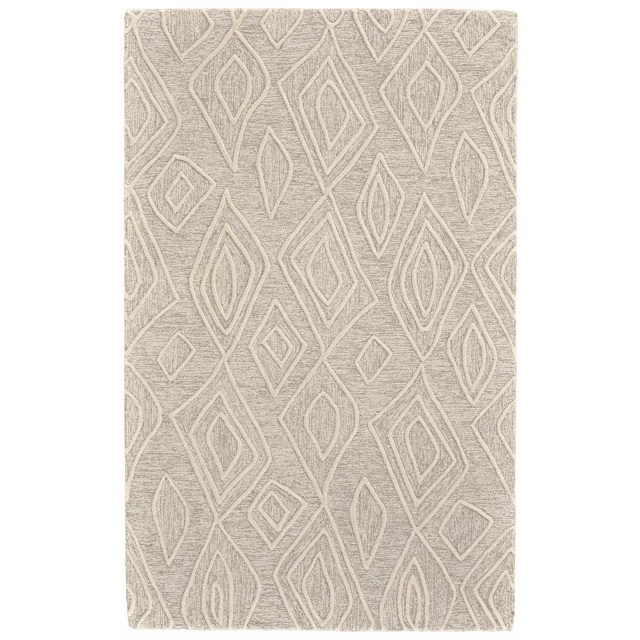 tufted handmade stain resistant area rug in brown and beige with a symmetrical pattern