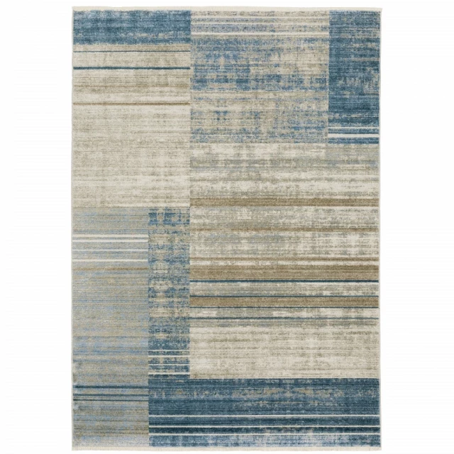 loom stain resistant area rug with fringe in beige and aqua pattern