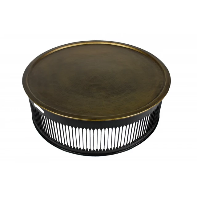 Black drum shaped brass coffee table with wood and circle design elements