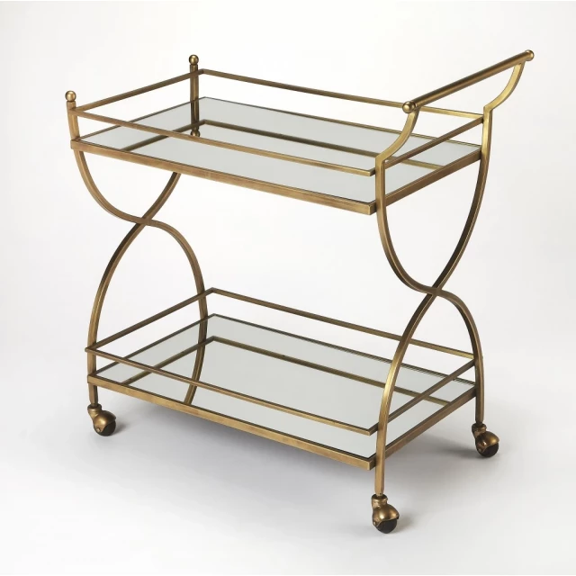 Antique gold bar cart with wood and metal details in an artful design