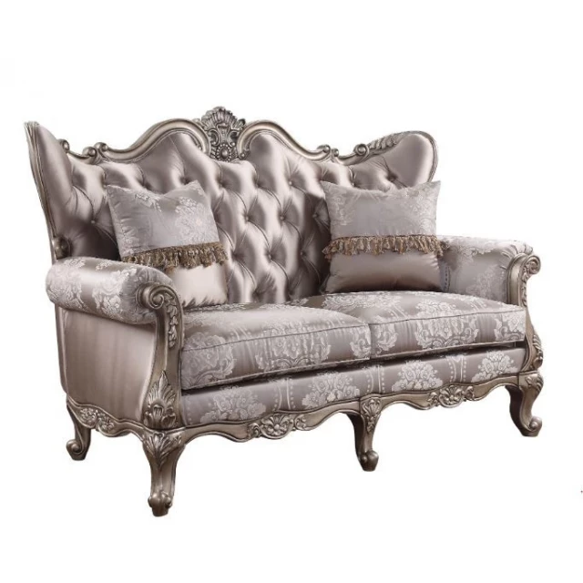 Platinum silk blend loveseat with toss pillows in a comfortable studio couch design