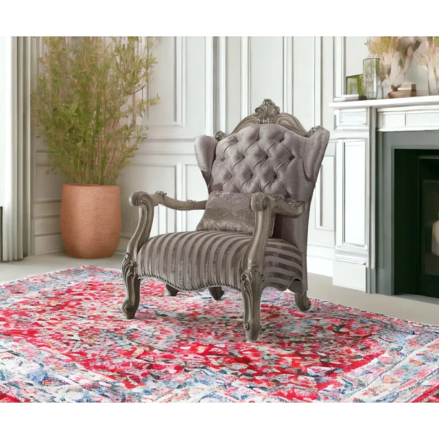 pearl velvet striped tufted chesterfield chair in elegant interior design with wooden floor and plant accents