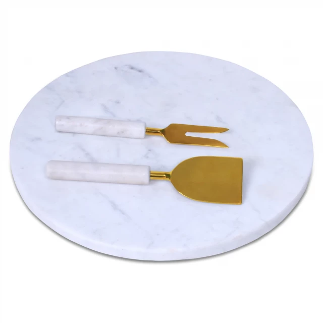 marble cheese board with gold cheese knives and tableware