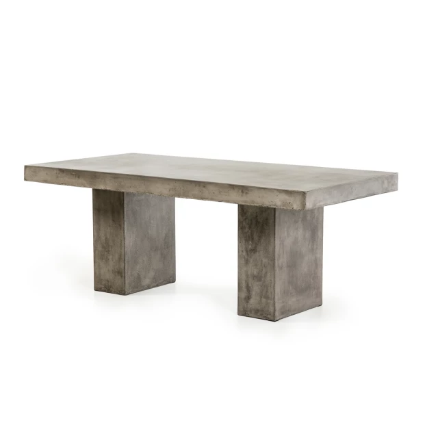 Dark gray concrete dining table with wood stain and outdoor furniture setting