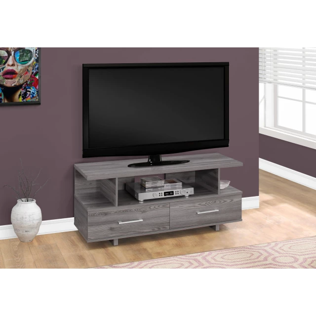 Board laminate TV stand with storage drawers in a modern living room interior design