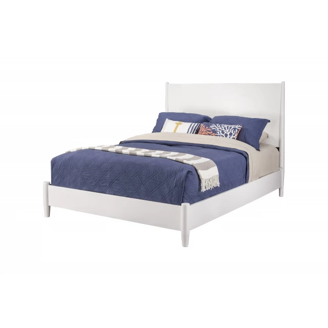 Solid manufactured wood California king bed in a modern bedroom setting