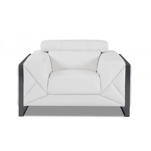 White leather chrome deco accent chair with plant and sofa bed features