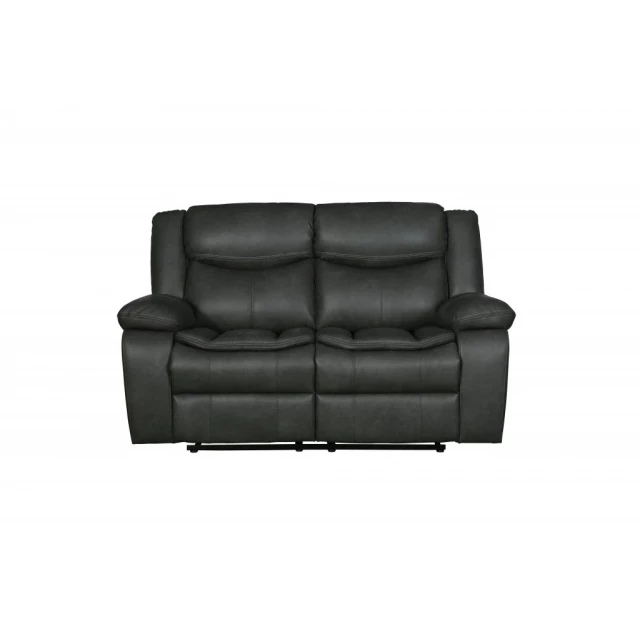 Faux leather manual reclining love seat with comfortable armrests and elegant tints and shades
