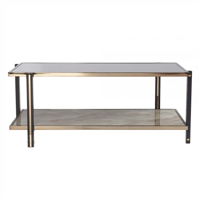 Mirrored metal rectangular coffee table in a wooden plank outdoor setting