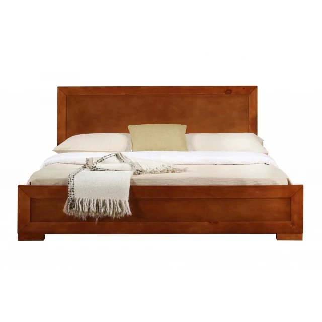 Cherry wood full platform bed in a modern bedroom setting