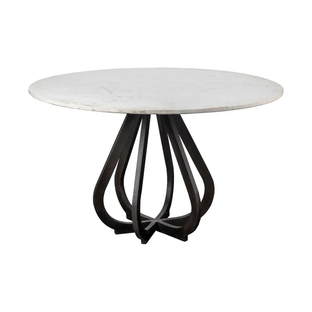 White marble dining table with black base and subtle outdoor shades