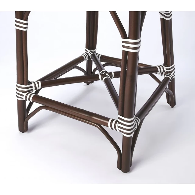 White dark brown rattan bar chair with intricate design elements