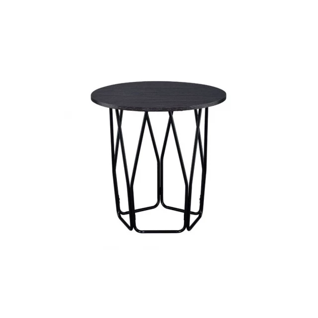 Round manufactured wood and metal end table with artful glass tableware