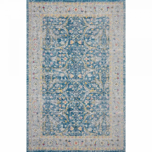 stain resistant indoor outdoor area rug with electric blue pattern and symmetrical design