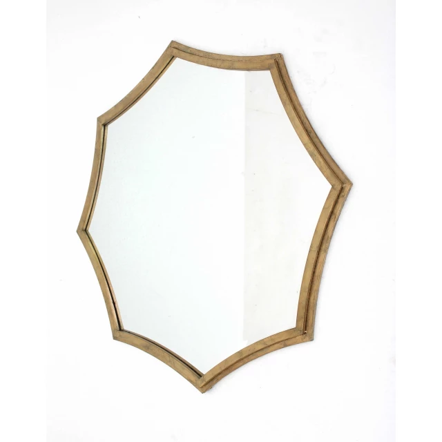 Gold curved hexagon frame cosmetic mirror featuring symmetry and art patterns