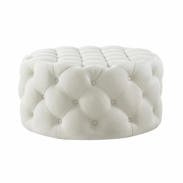 Black rolling tufted round cocktail ottoman with plush comfort and elegant wood art design