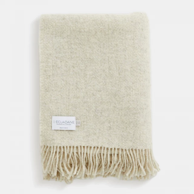 Natural woven wool solid reversible throw in beige