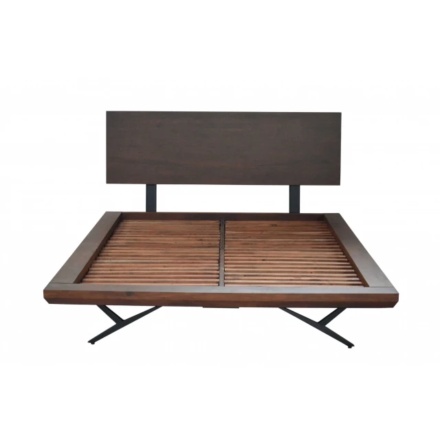 King-sized bed with brown black wood and metal frame